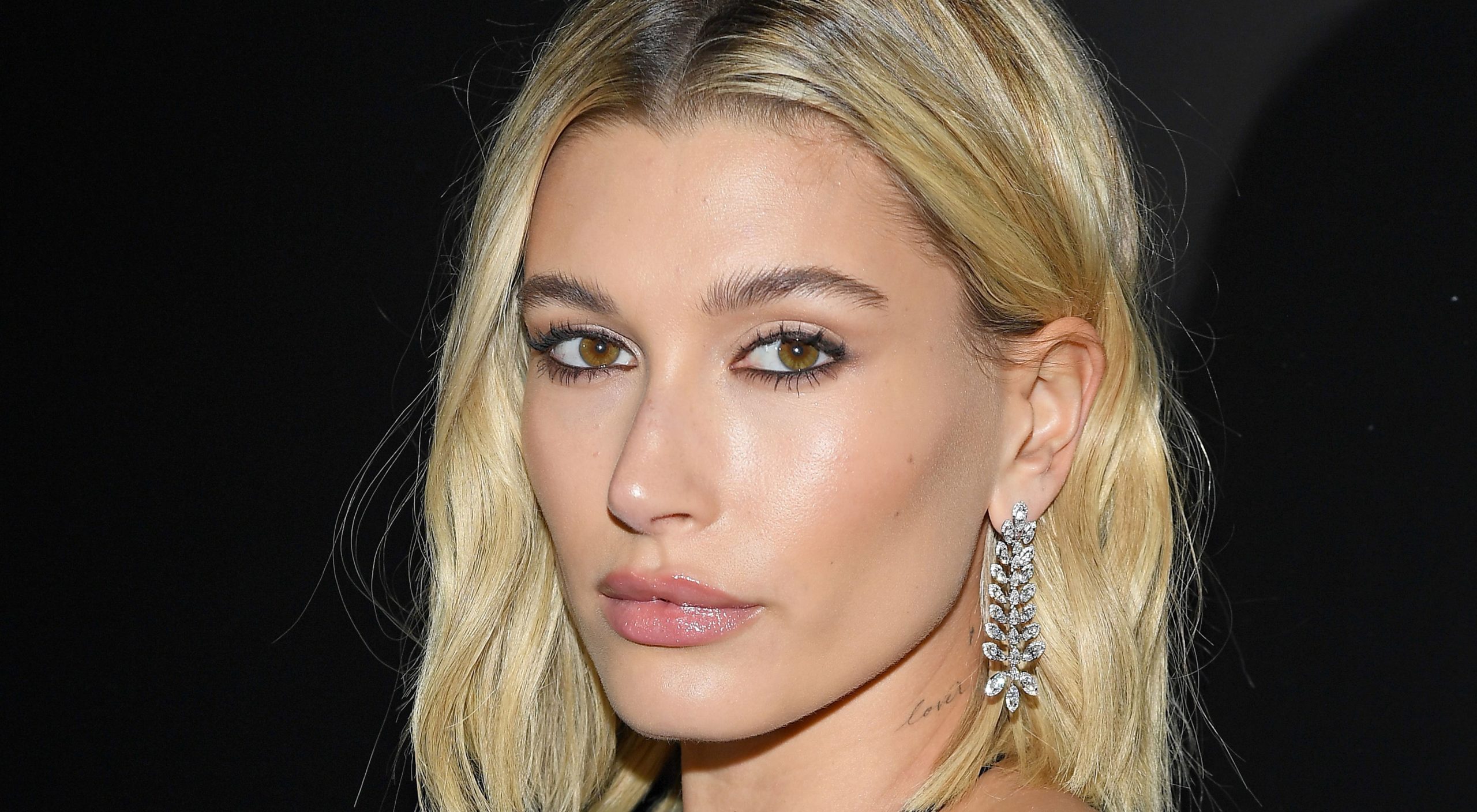 Hailey Bieber Debuted the Prettiest Iridescent Purple Eyeliner Look — See the Photos