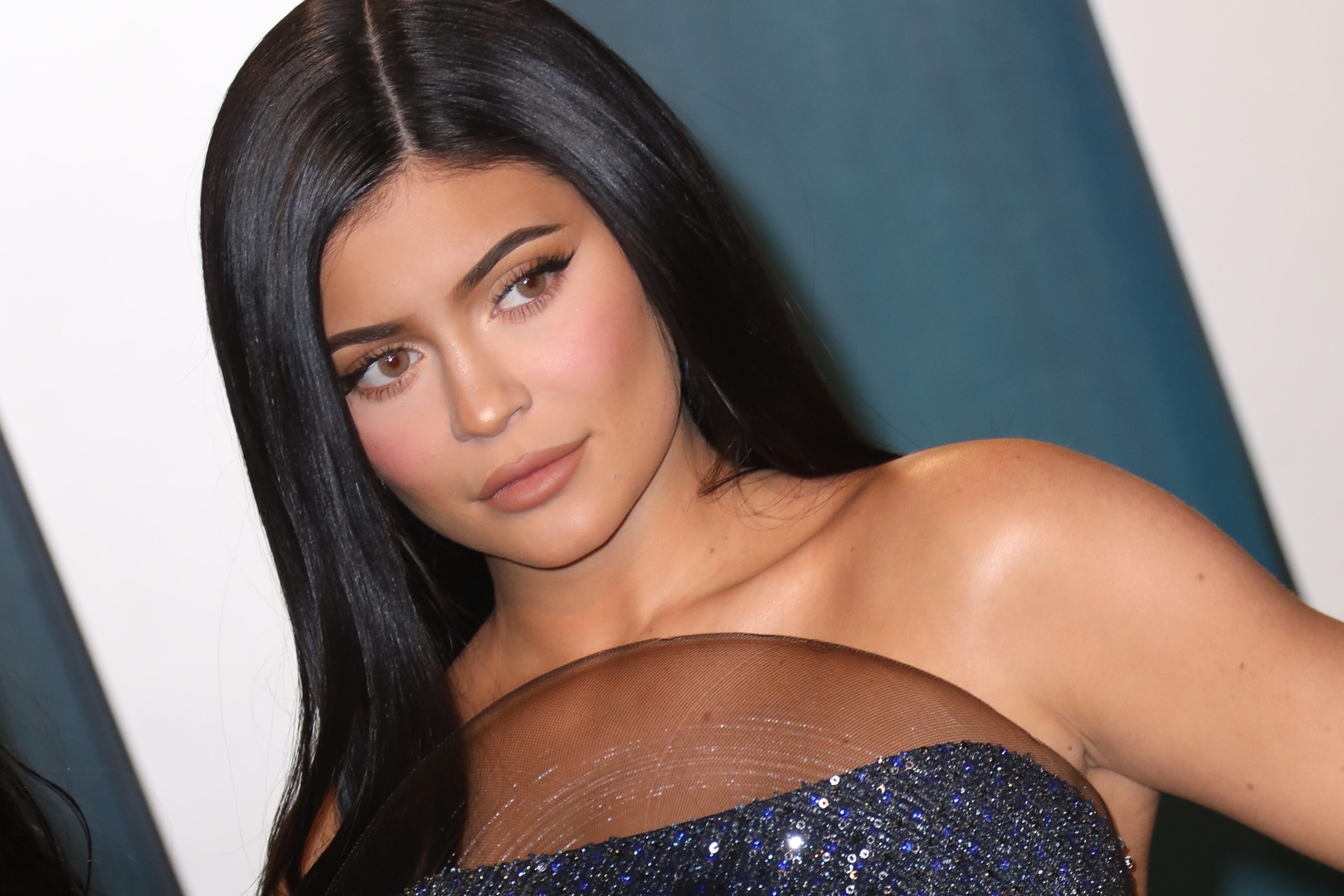 Kylie Jenner Got a Mismatched French Manicure With Neon Orange and Green Tips