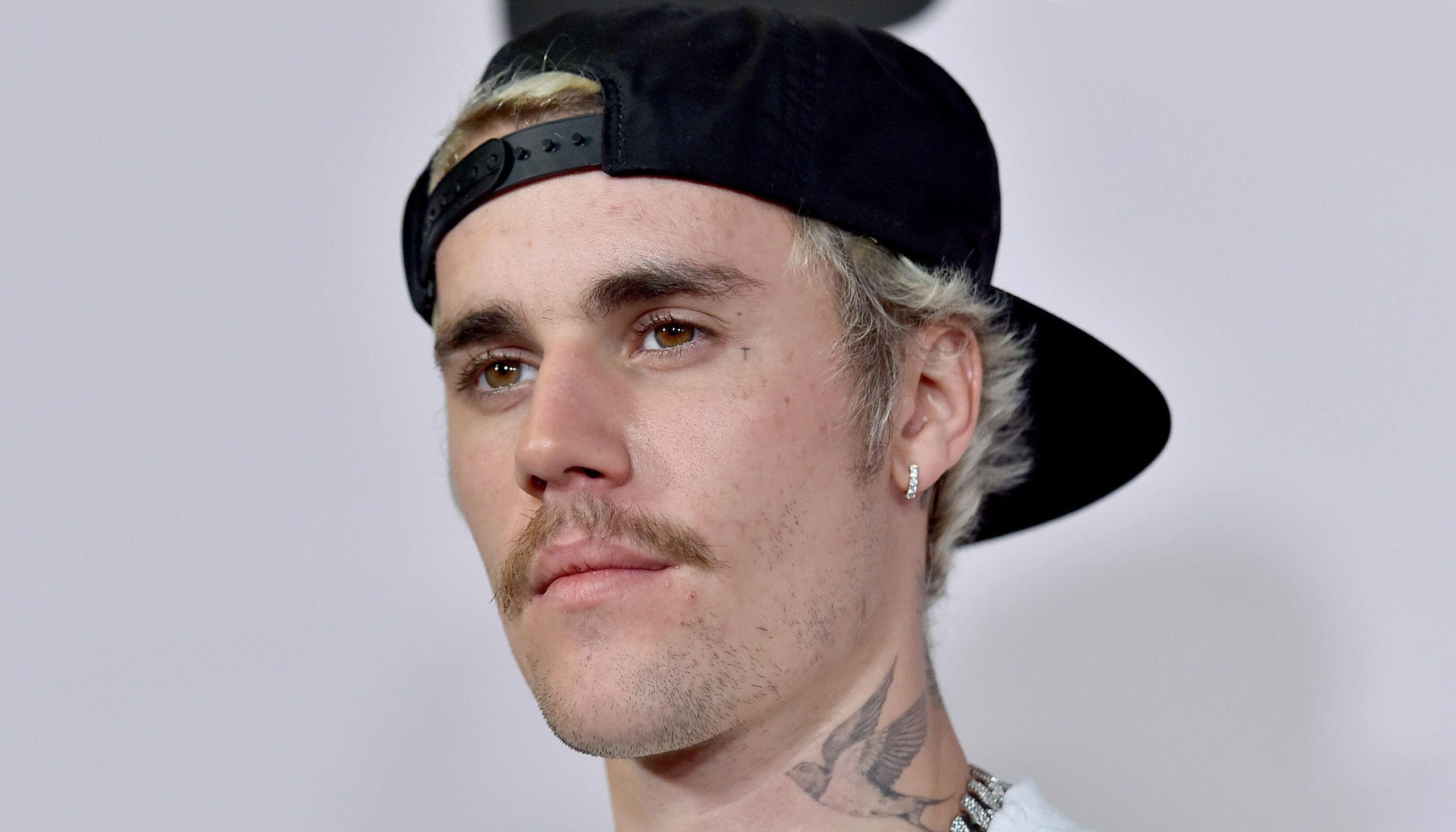 Justin Bieber Gets Realistic Rose Neck Tattoo From Dr. Woo