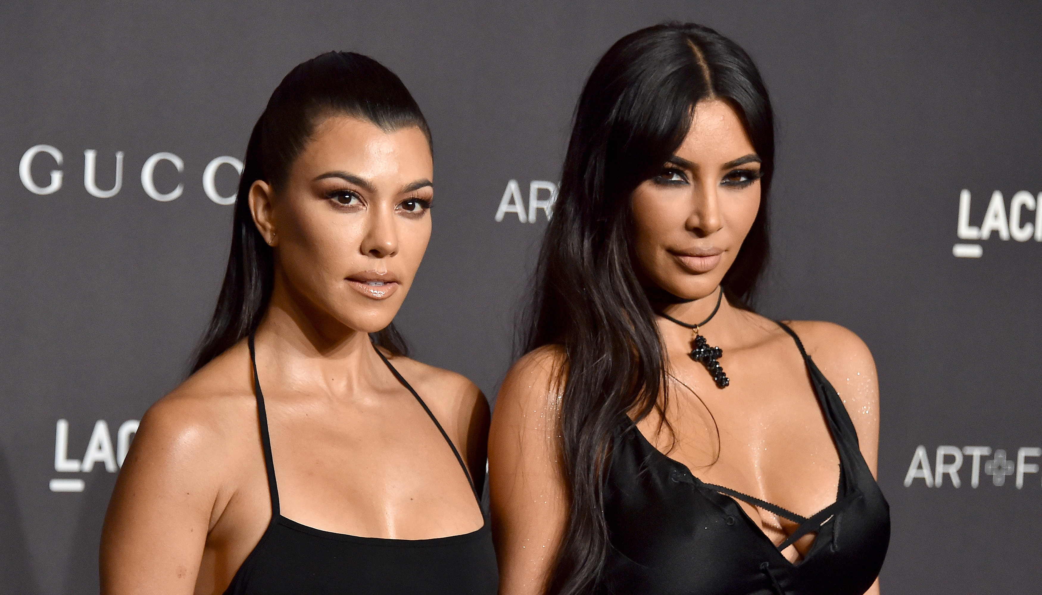 Kim Kardashian Shared a Throwback Photo of Her and Kourtney With Overplucked Eyebrows