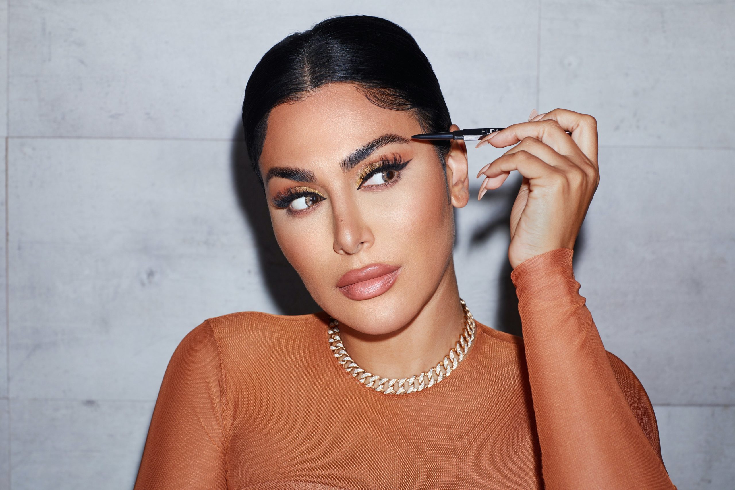 Huda Beauty's First-Ever Brow Product Is the Finest Pencil We've Ever Seen