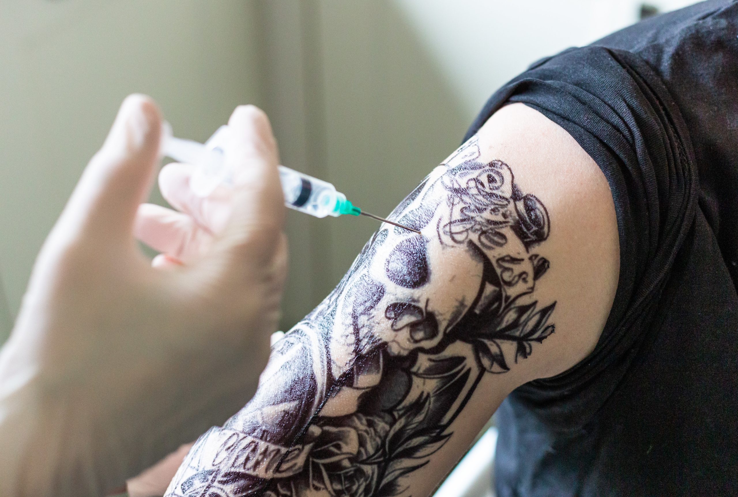 Should You Wait Between Getting a Tattoo and a COVID-19 Vaccine?